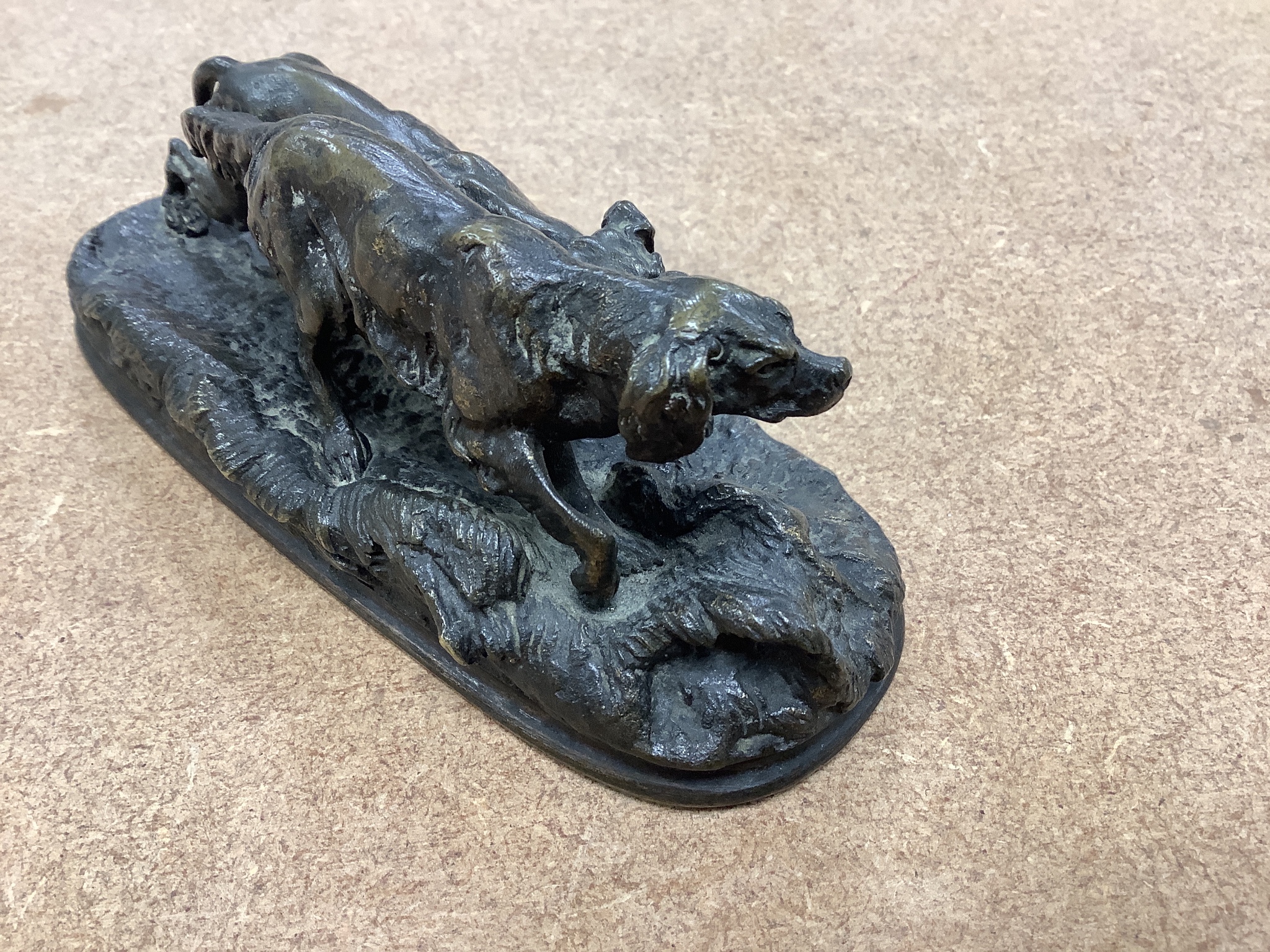 After P. J. Mene, a small bronze model of two gun dogs, Width 13.25cm